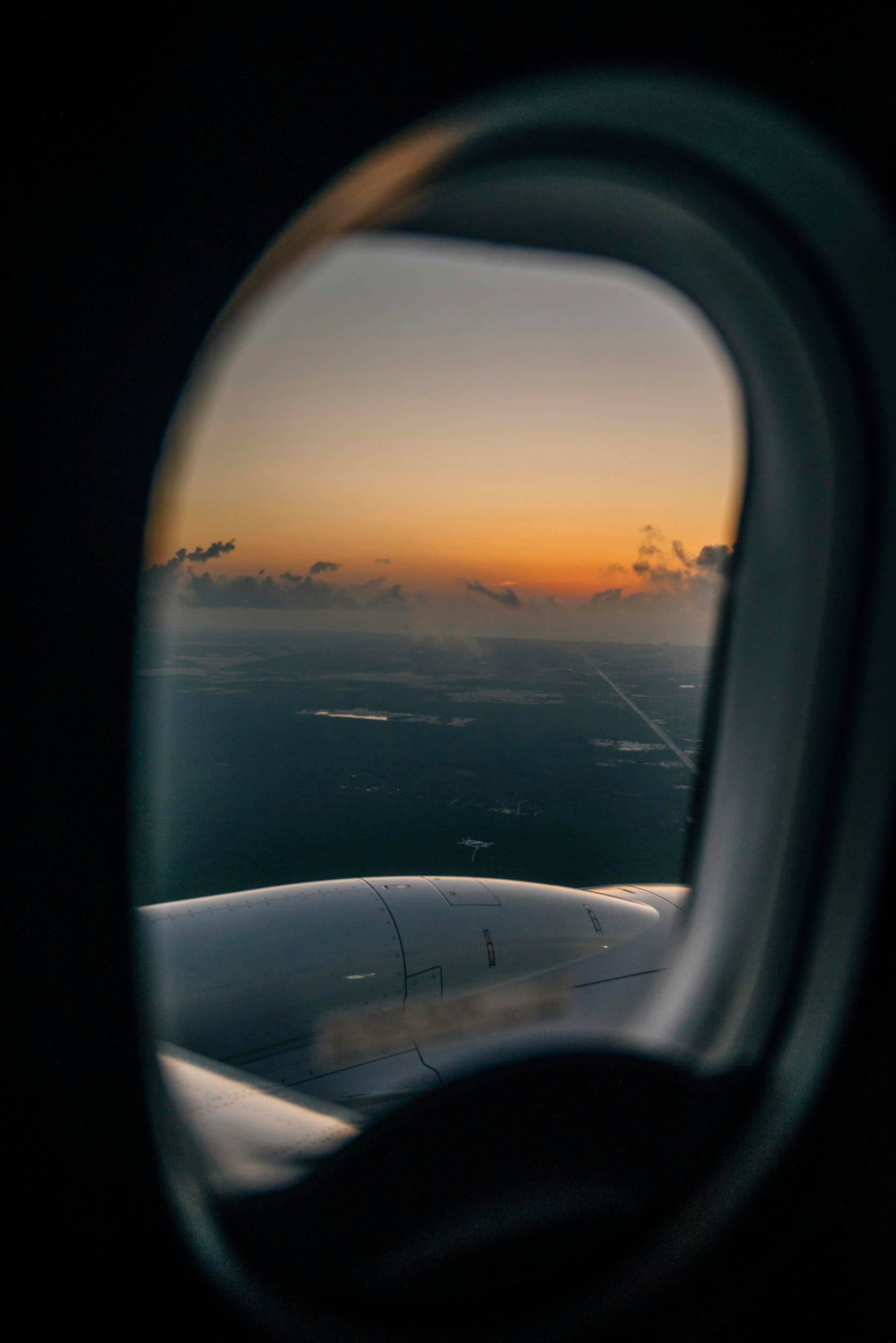 Sunset view from a private jet window